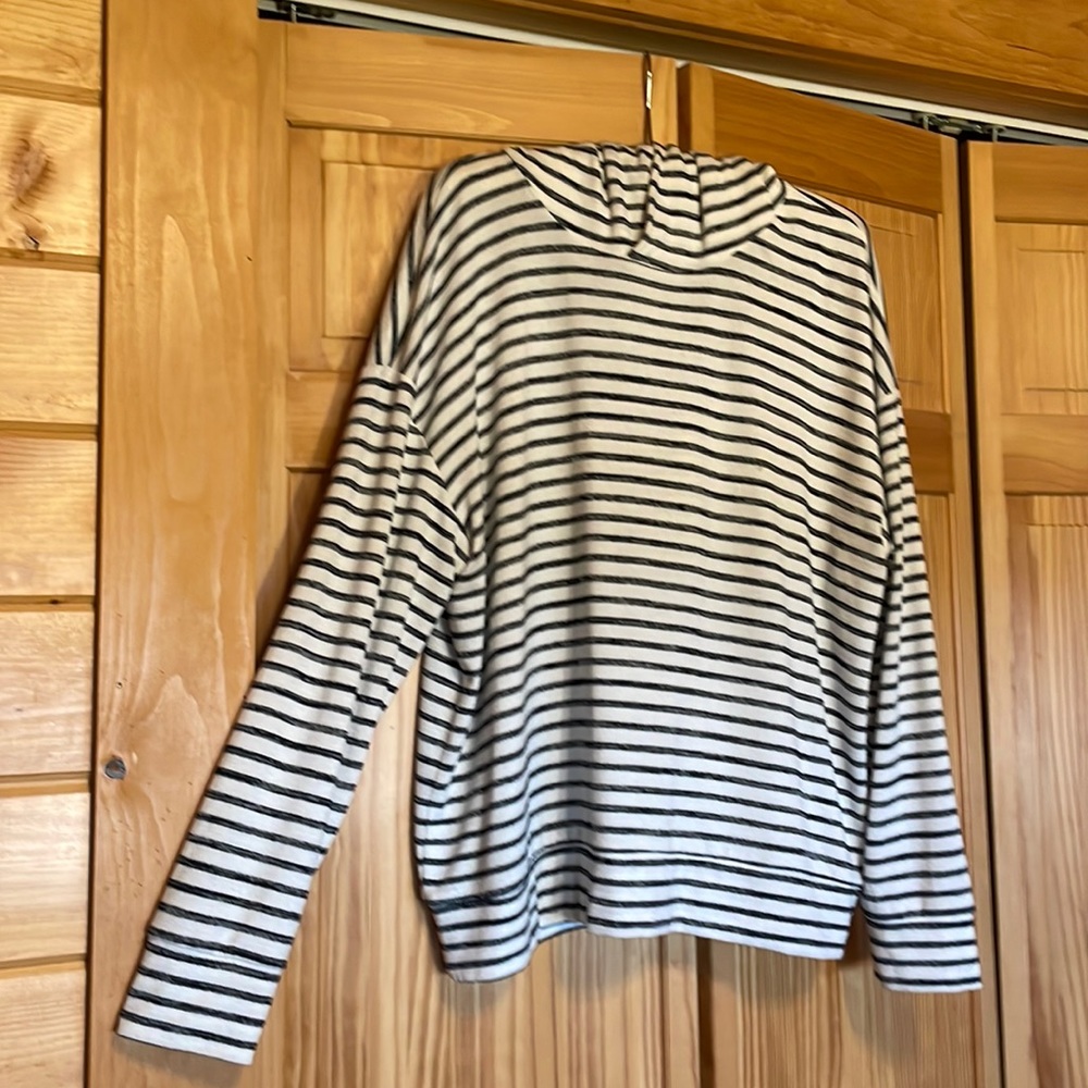 Cream and black striped top.
